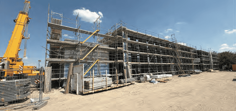 WOHNGEBÄUDE für GEFLÜCHTETE